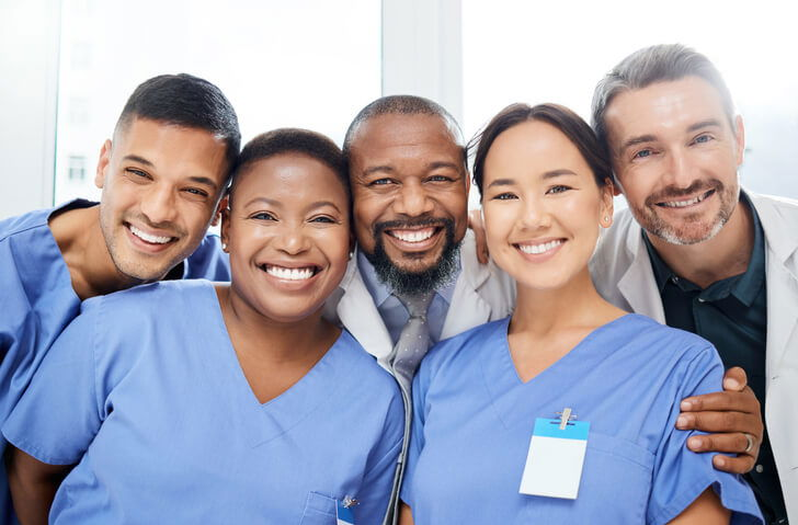 Practical nurses and a physician in a hospital after practical nurse training