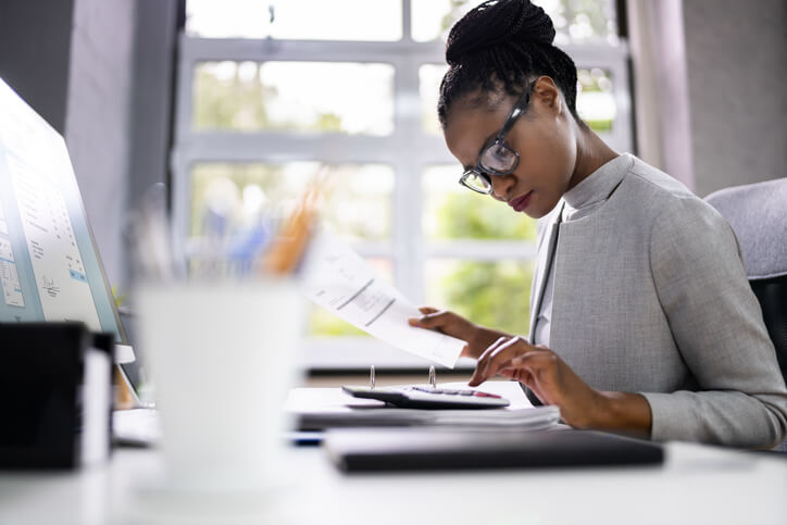 A student of our business finance management program studying from home