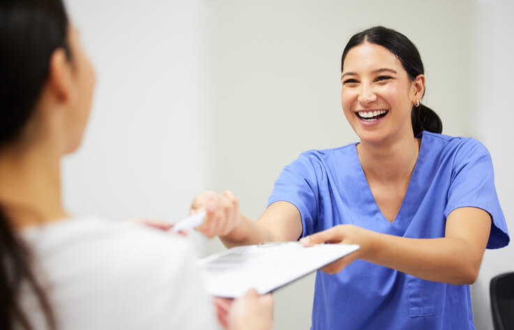 Healthcare assistant interacting with a patient after healthcare assistant training