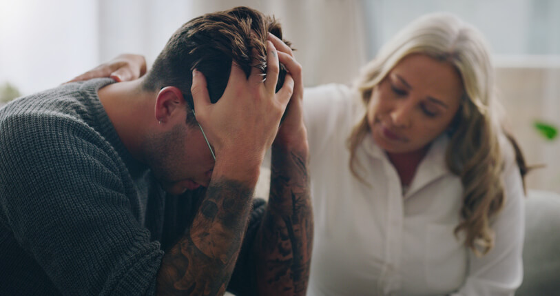 Crisis response and mental health training graduate offering support to male