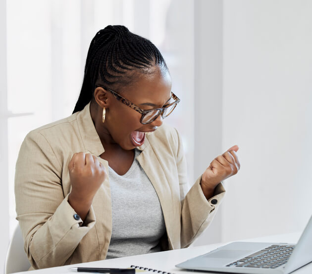 A relaxed dental assistant trainee taking an online dental reception training program 