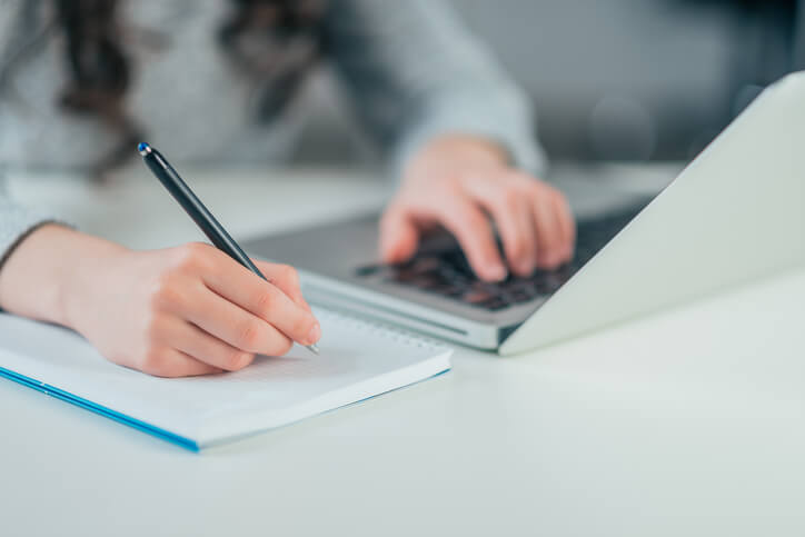 A career college student doing coursework online