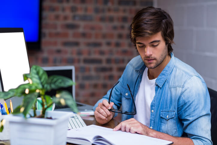 Focused student completing homework at a desk