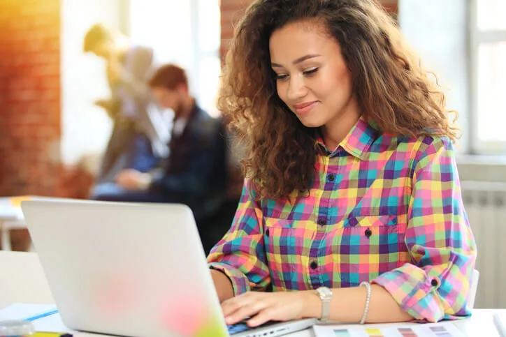 A digital marketing training student building an online portfolio