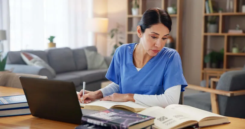 A mature student studying healthcare prerequisites for a nursing program