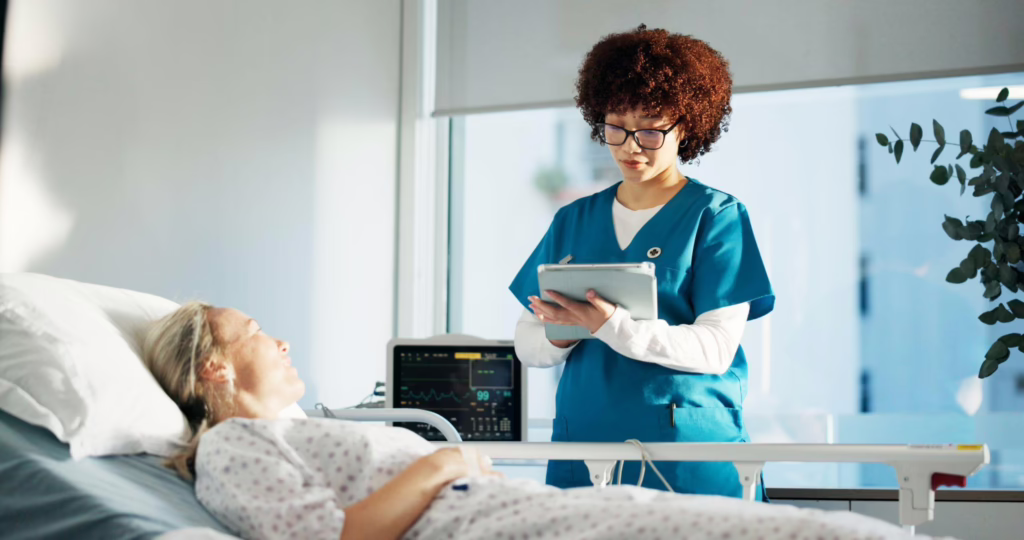 Nursing student observing a patient and recording changes in vital signs